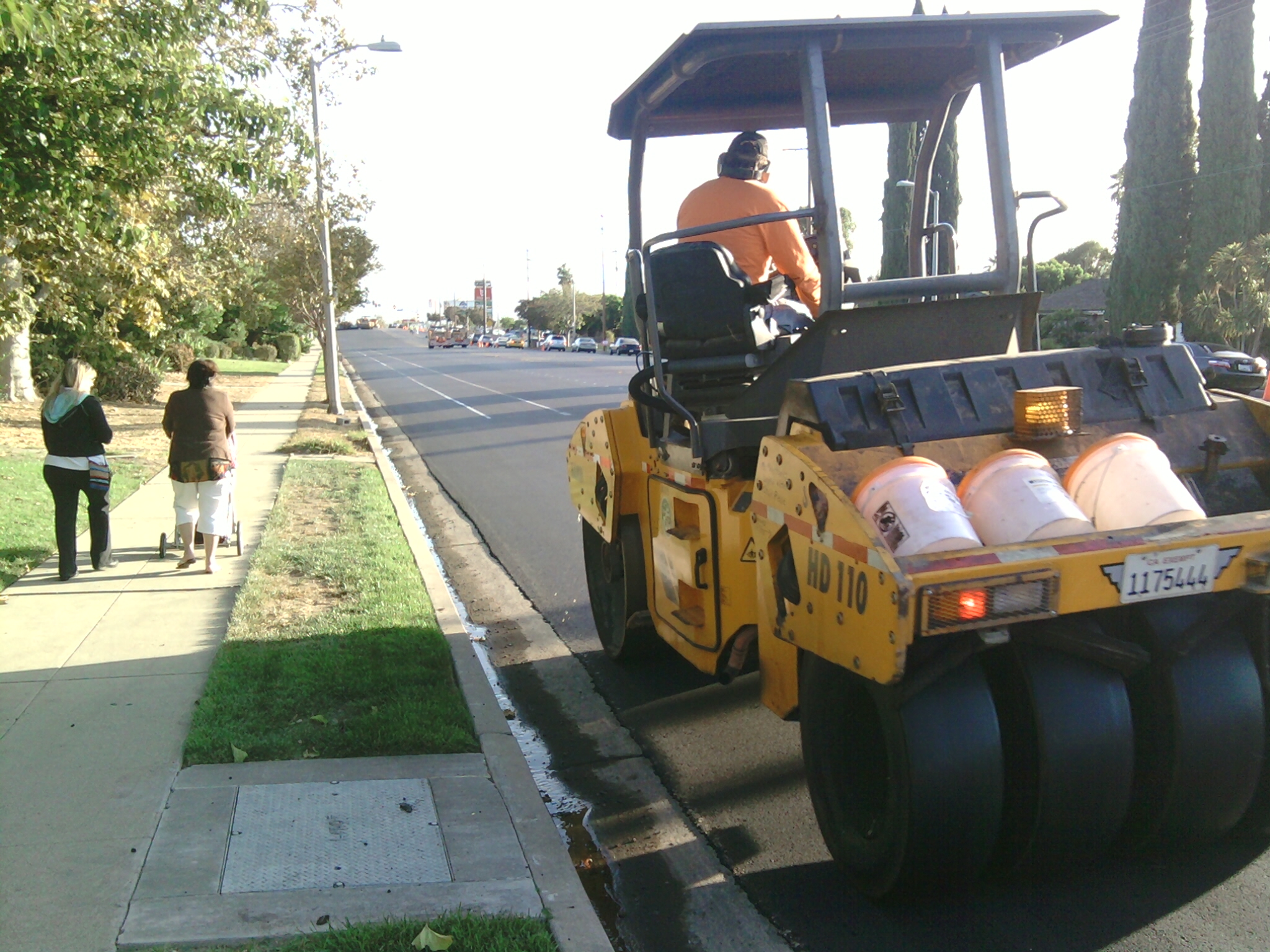 City Steamroller Truck Making the New Bike Lanes Nice and Flat